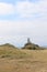 TÅµr Mawr lighthouse, on Ynys Llanddwyn on Anglesey, Wales, marks the western entrance to the Menai Strait.