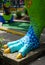 T. rex foot at miniature golf course - vertical