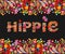 T shirt design on black background with colorful floral border and hippie flowers lettering print