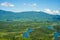 Ta Dung lake in the summer. Blue sky and cloudy on the lake and the trees on the small island paradise. Dak Nong global geological