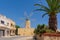 Ta` Kola Windmill and the palm in Xaghra village, in Gozo island, Malta