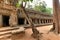 Ta Prohm is the modern name of a temple originally called Rajavihara. East of Angkor Thom