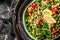 Tabbouleh salad closeup, Part of middle eastern meze. Top view