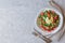 Tabbouleh Tabouli salad on light gray concrete background