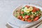 Tabbouleh Tabouli salad on light gray concrete background