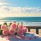 Table adorned with pink roses against scenic beach, evoking romance