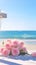 Table adorned with pink roses against scenic beach, evoking romance