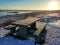 A table with a bench for resting covered with snow in winter in Iceland