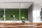Table in blurry green coworking style office