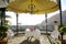 Table with bottles and glasses under a gazebo - wedding reception in a summer day in Pozzuoli near Naples