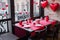 A table in a cafe decorated for Valentine's Day. Festive decor. Generative AI.