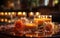 Table of candles on the terrace of the restaurant, blurred night city in the background.
