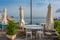 Table and chair on the waterfront of Porto d'Ischia town at Isch