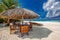 Table and chairs at the beach on tropical island , Maldives