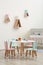 Table and chairs with bunny ears in baby room. Interior design