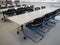 table and chairs in the meeting room or in the auditorium. Library, office, or premises in an official institution or