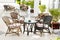 Table and chairs at patio of hotel outdoors