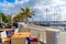 Table with chairs in restaurant in Puerto Calero marina