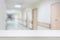 table counter with hospital interior corridor background