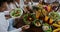 Table With Dishes Of Tropical Fruits And Salad Top Angle View People Group Eating Healthy Vegetarian Food Together