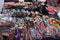 A table filled with colorful souvenirs at the Pisac Market in Peru