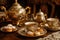 A table filled with tea cups and plates topped with delicious pastries, creating a delightful and inviting scene, An ornate