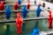 Table football game with red and blue players. Red