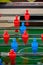 Table football, table football with a close-up of red and blue players