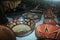 A table full of home made ceramic bowls, a typical design of the mockawas in the amazon of Ecuador