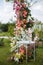 Table with glass box on wedding zone decorated with flowers