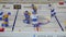 Table hockey game with bright figures on arena closeup