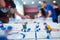 Table hockey game with player on background