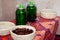 A table inside a mosque in a corner with dried dates fruit, water and fresh juice for the fasting Muslims