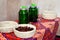 A table inside a mosque in a corner with dried dates fruit, water and fresh juice for the fasting Muslims to have a snack