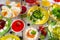 Table laden with various kinds of jellies