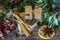 On the table laid Christmas decorations. Cake, cinnamon, star anise, pieces of dried lemons, pine branch.