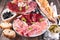 Table with meat, bread, olive