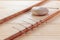 Table with needles for acupuncture. Silver needles for traditional Chinese acupuncture medicine on table. The full depth of cut