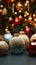 A table with ornaments in front of a tree with golden orbs and s