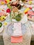 An table scape decorated in an eclectic colorful way