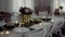 Table set for a meal indoors in a room on a party, a wedding or family celebration.