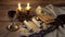 A table set for Shabbat with challah bread, candlesticks and wine. wood background.