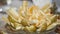 Table setting. Bowl of fruit. Pear slices, tangerine slices and banana slices stacked for food.