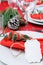 Table setting for christmas in red and white