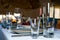 Table setting. Cutlery. Glass, stack, bowls and fork on the table