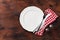 Table setting. Empty plate, knife, fork, spices and napkin. Top view and flat lay with copy space