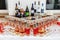 Table setting for a holiday or party. Glasses for spirits, champagne and juice. Whiskey-Cola drink. Close-up. Russia, Saint