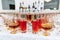 Table setting for a holiday or party. Glasses for spirits, champagne and juice. Whiskey-Cola drink. Close-up. Russia, Saint