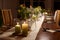 Table setting for a large dinner party with family and friends decorated with candles, spring flowers and various drinking glasses