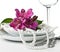 Table setting with pink alstroemeria flowers